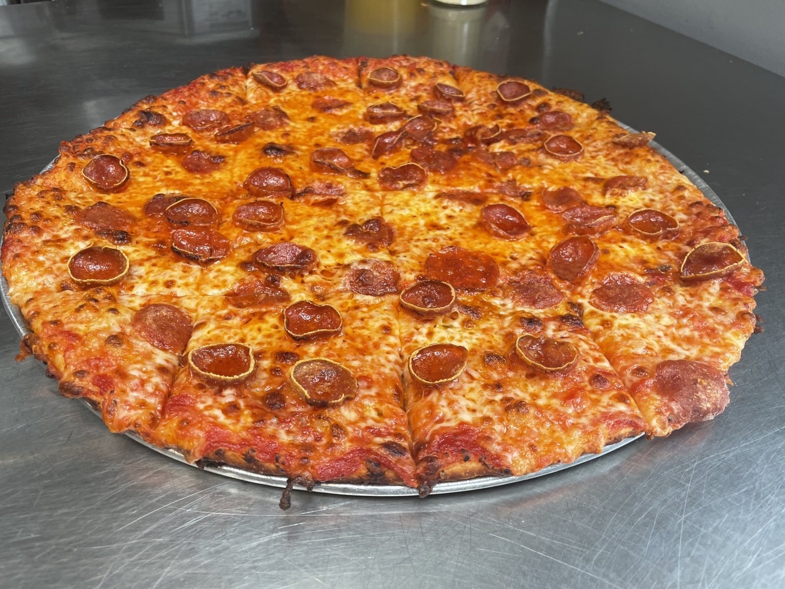 Tavern style pepperoni pizza