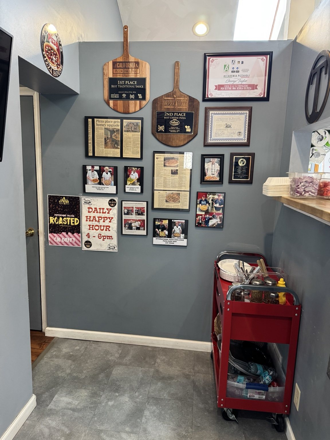 Taylors Pizza House awards wall